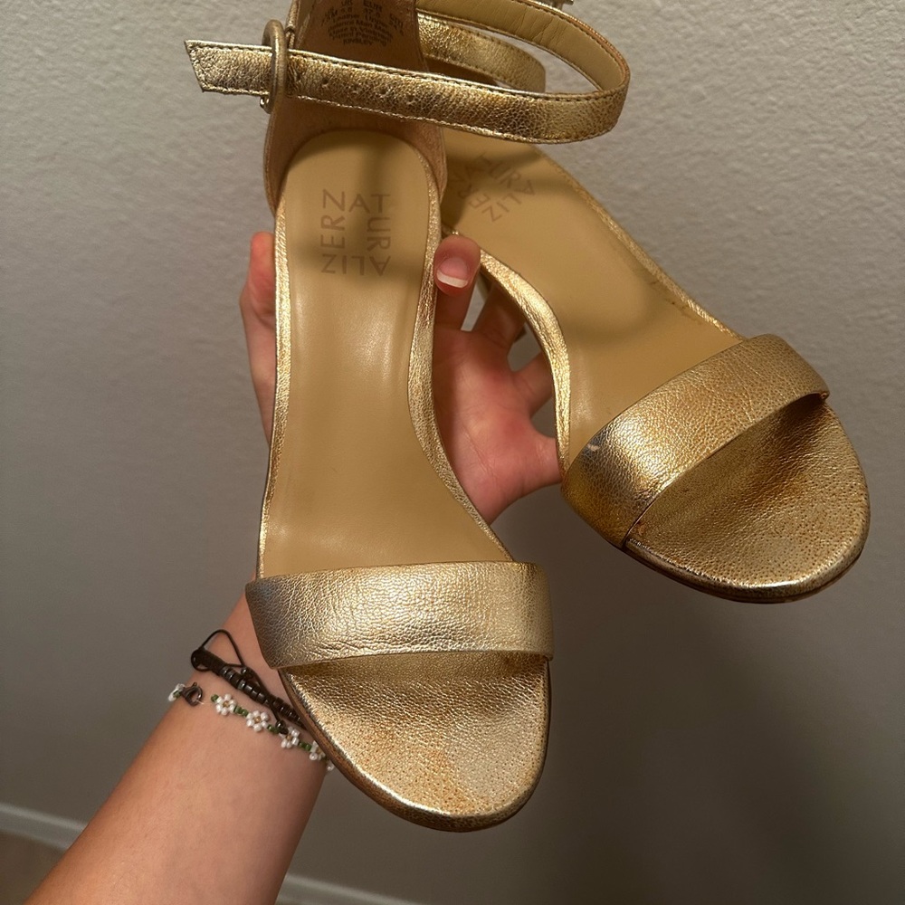 Gold strappy pumps